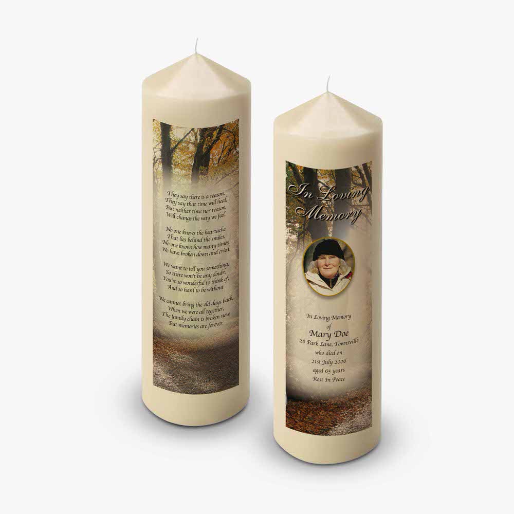 a funeral candle with a photo of a tree and a poem
