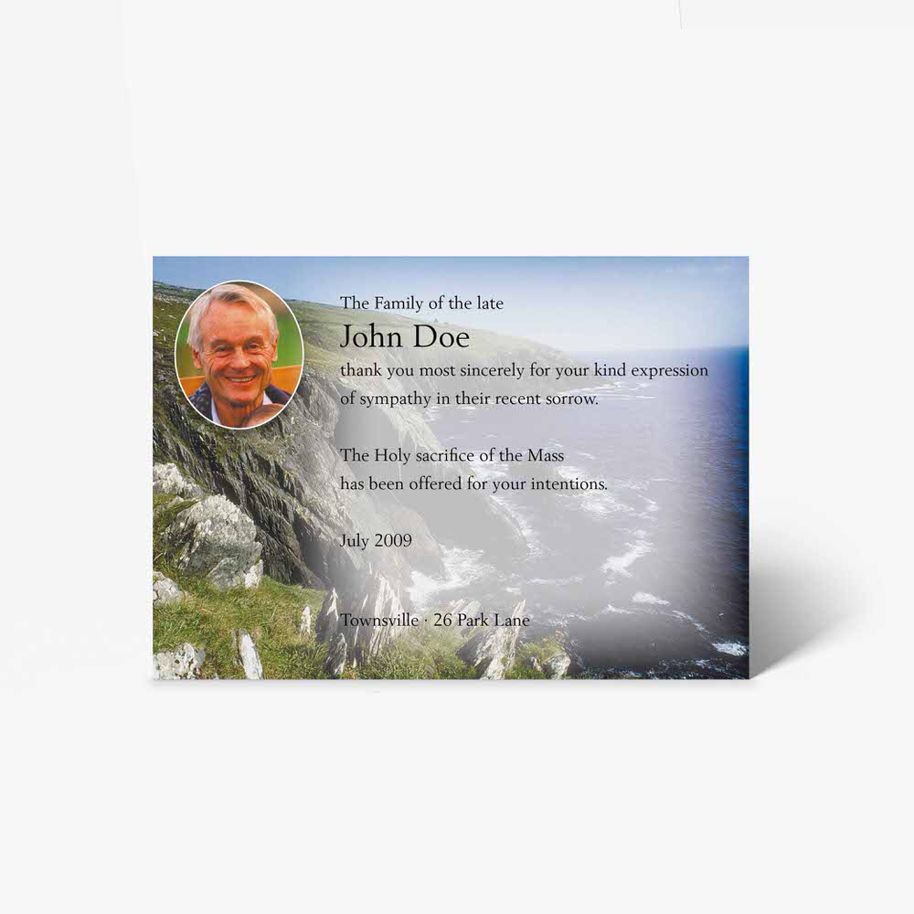 funeral card with photo of a man on a cliff
