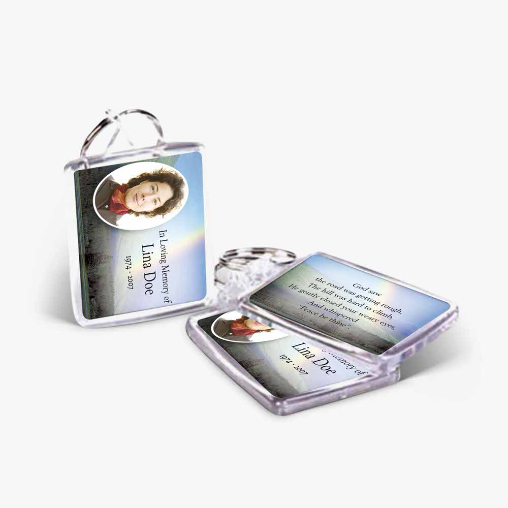 a photo card and a key chain with a picture of a woman