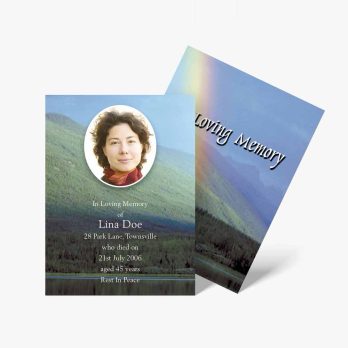 a funeral card with a photo of a woman in a forest