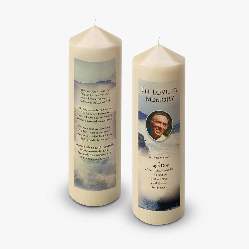 a candle with a photo of a man on it
