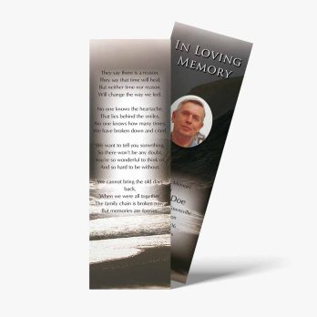a bookmark with a photo of a man on the beach