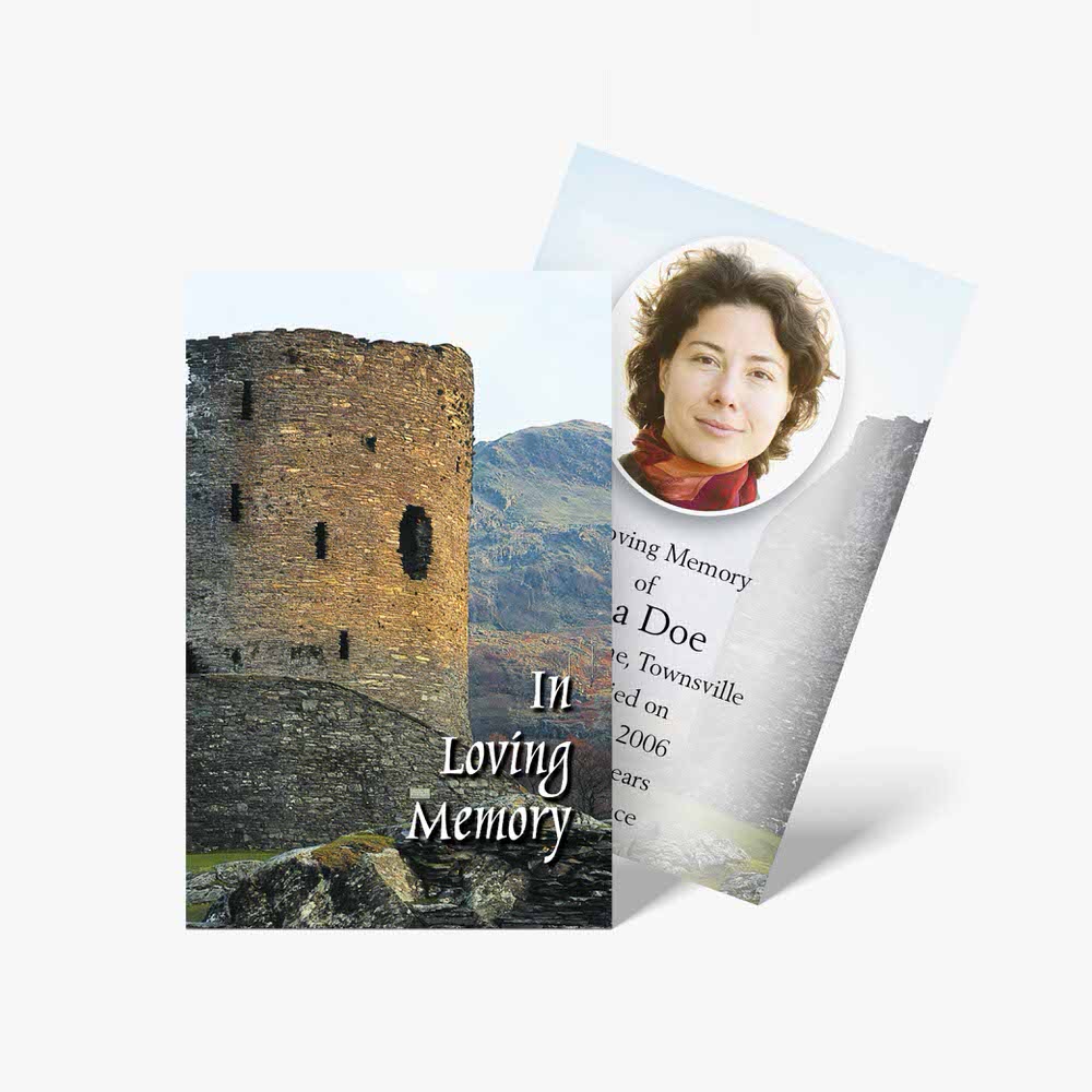 a funeral card with a photo of a woman in front of a castle