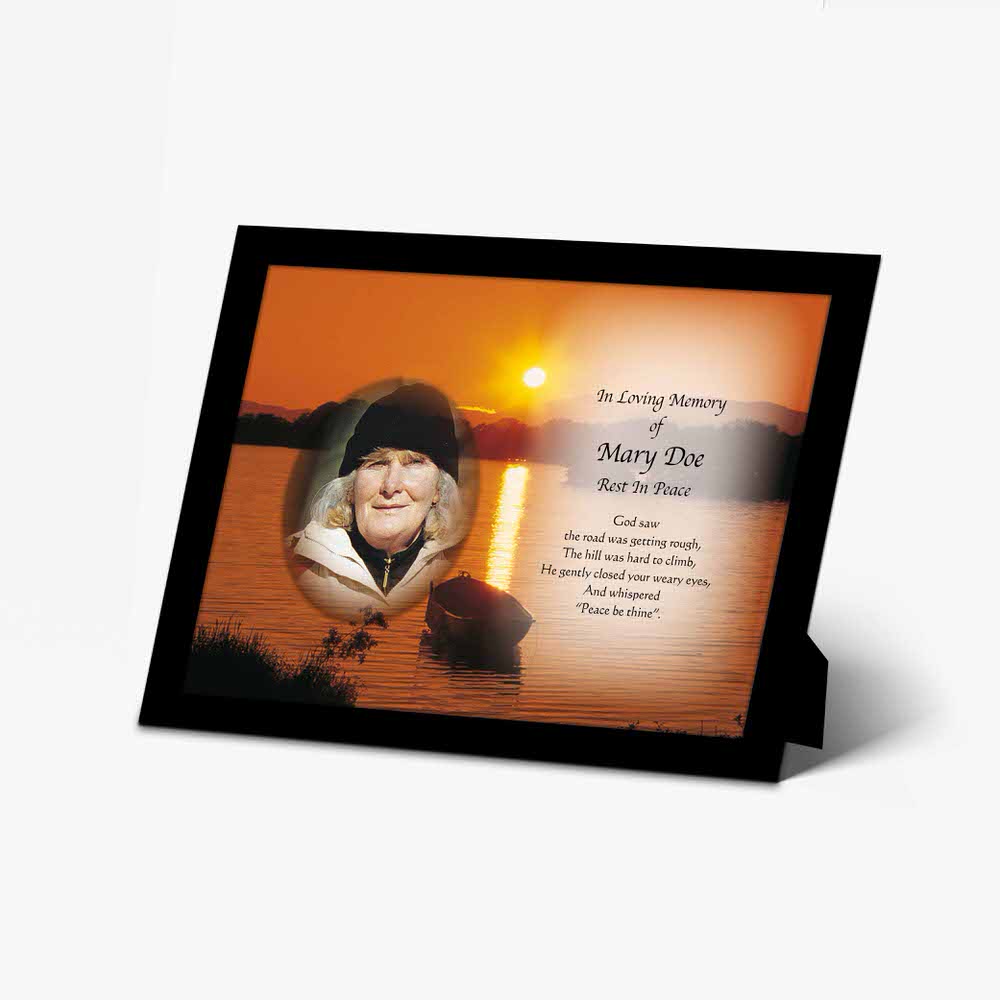 a photo frame with a sunset photo of a woman on a boat