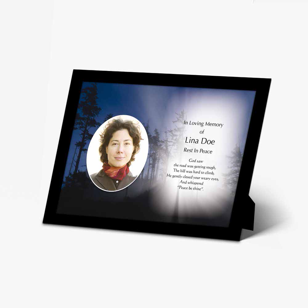 a memorial photo frame with a picture of a woman