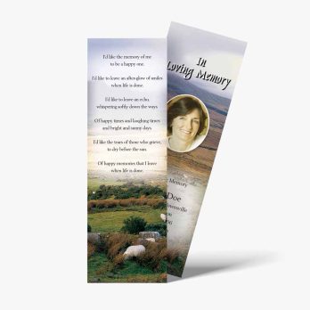 a bookmark with a picture of a field and a poem