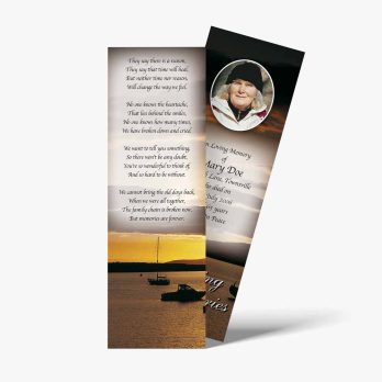 a bookmark with a photo of a boat and a sunset