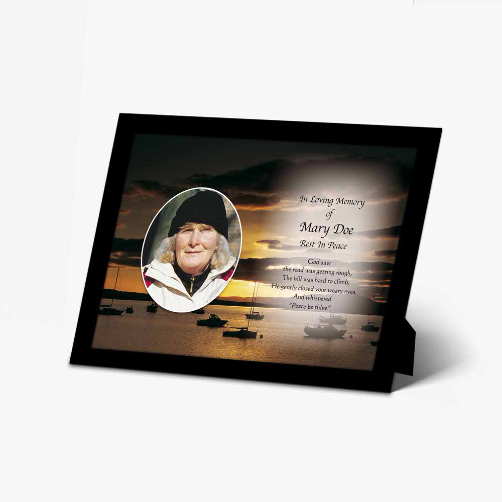 a memorial photo frame with a picture of a woman