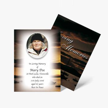 a funeral card with a photo of a woman on it