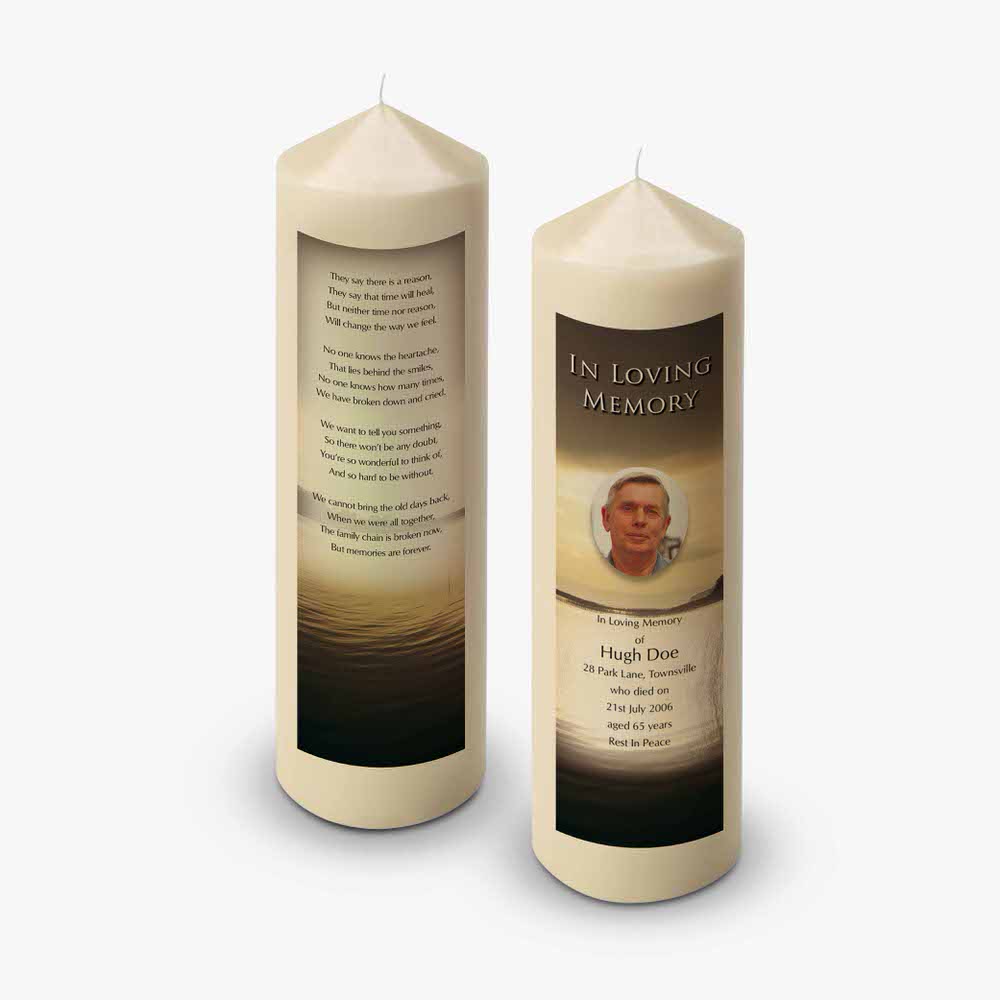 a candle with a photo of a man and a poem