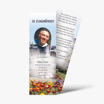 a bookmark with a photo of a man and flowers