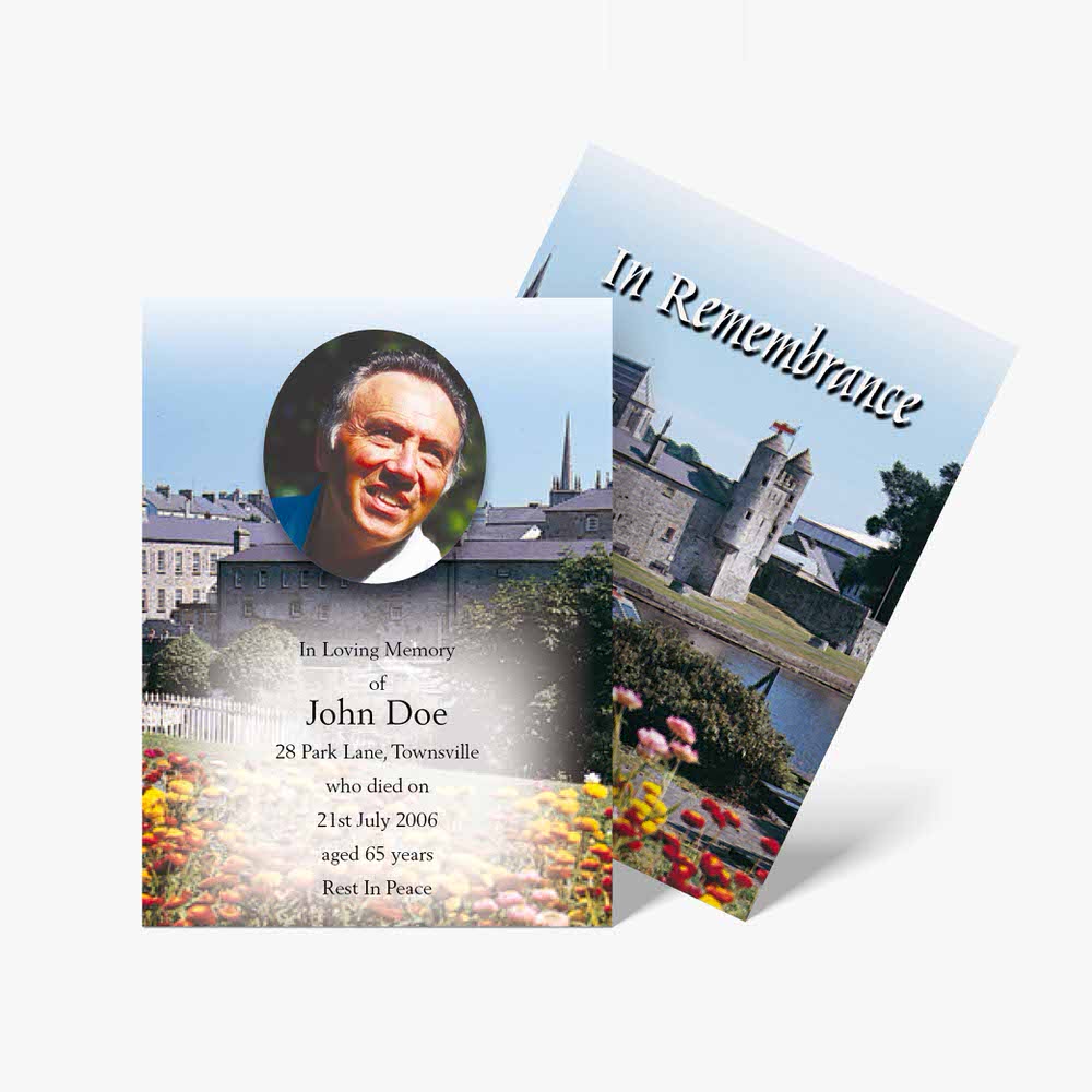 a memorial card with a photo of a castle
