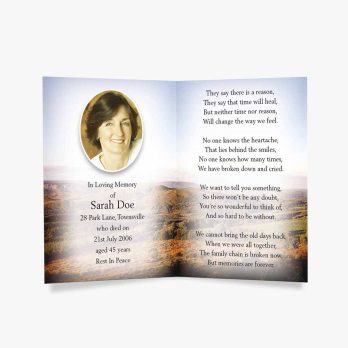 a funeral card with a photo of a woman in a field