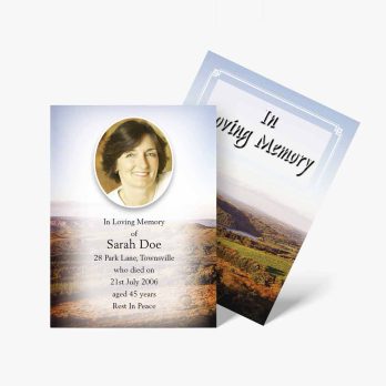 a funeral card with a photo of a woman in the mountains