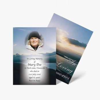 a funeral card with a photo of a man in a hat