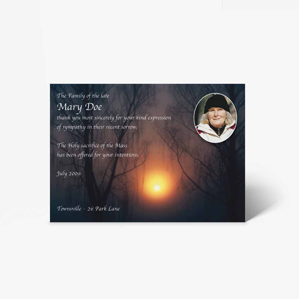 a funeral card template with a photo of a person in the forest
