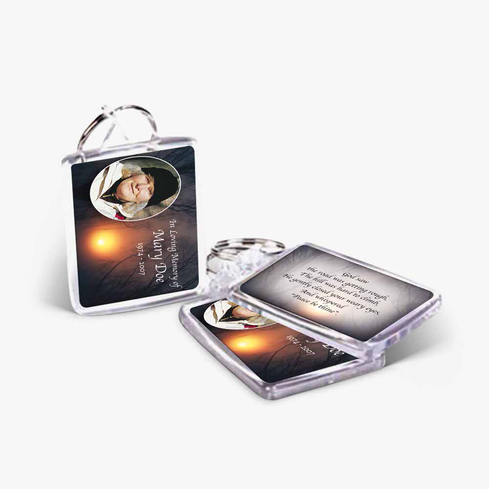 a photo keychain with a picture of a person