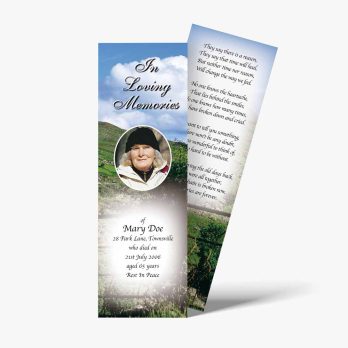 a bookmark with a photo of a woman in a field