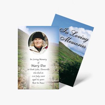 a funeral card with a photo of a woman in a field