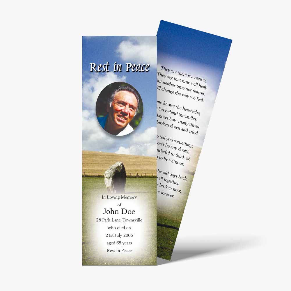 a bookmark with a photo of a man in a field