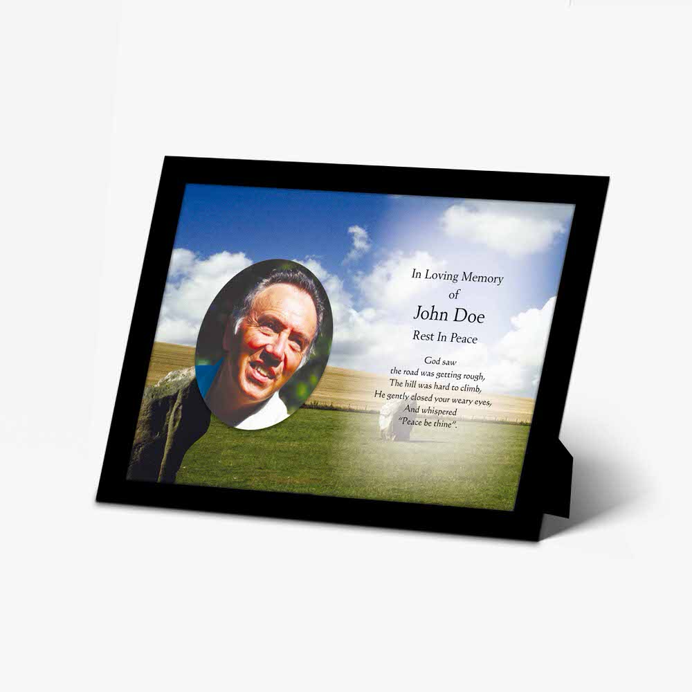 a photo frame with a photo of a man in a field