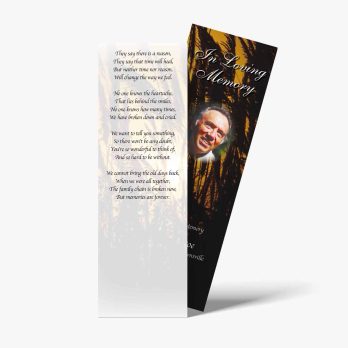 a bookmark with a photo of a man in a forest