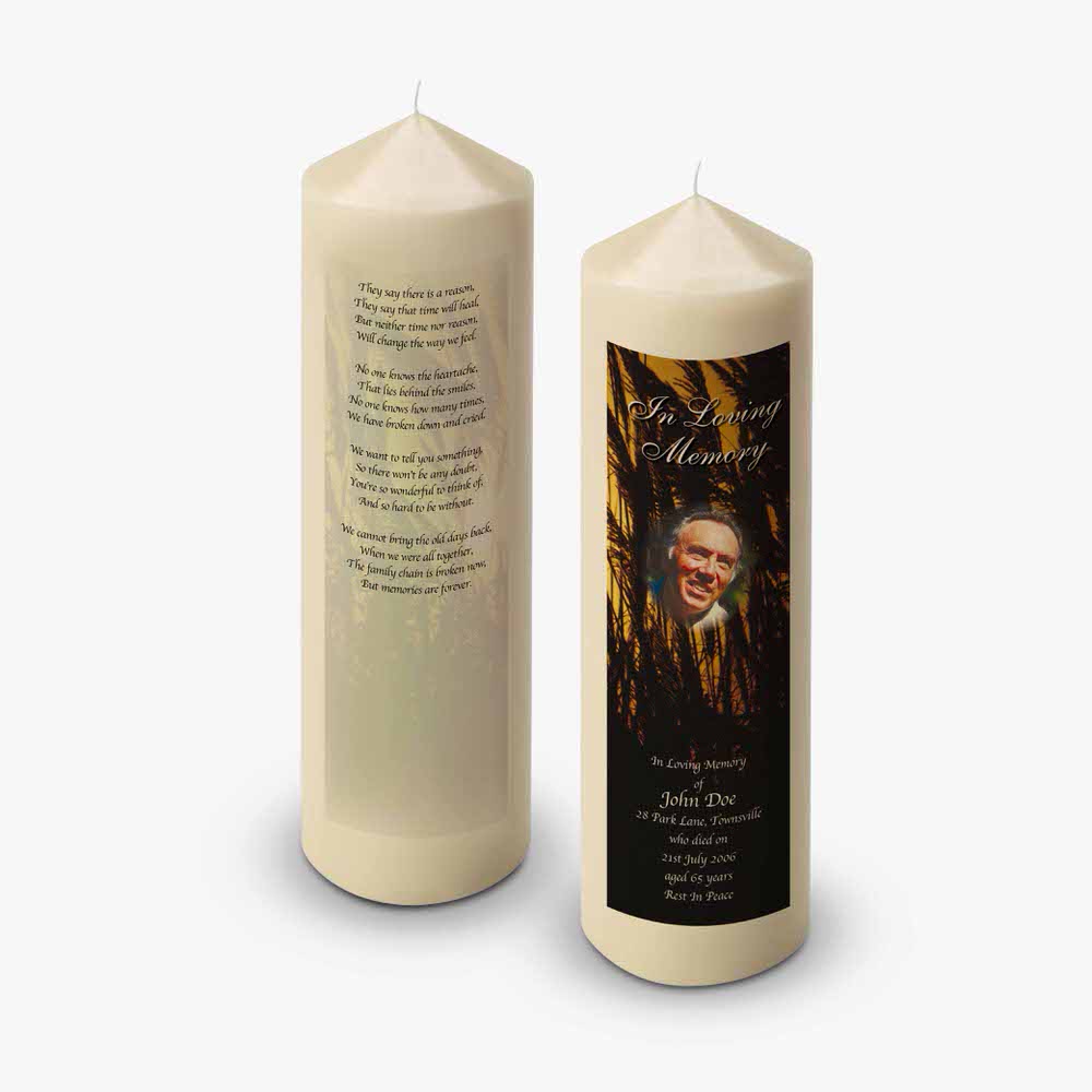 a candle with a picture of a man on it