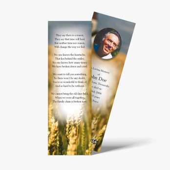 a bookmark with a photo of a man in a field