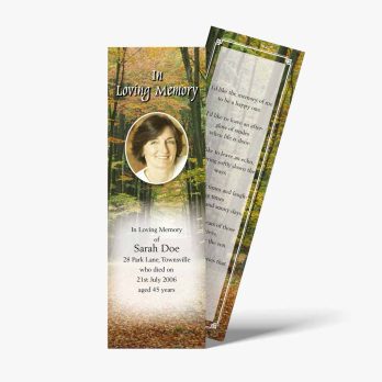 a funeral bookmark with a photo of a woman in the woods