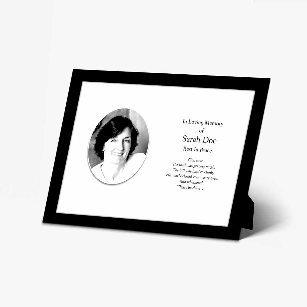 a black and white photo frame with a black and white photo of a woman