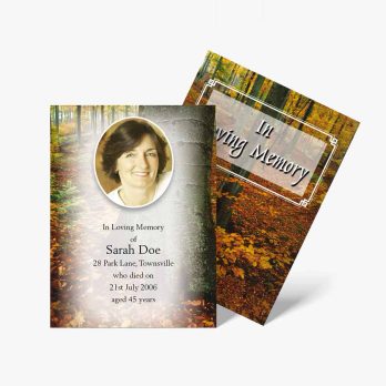 a funeral card with a photo of a woman in the woods