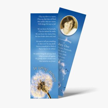 a bookmark with a photo of a dandelion and a quote