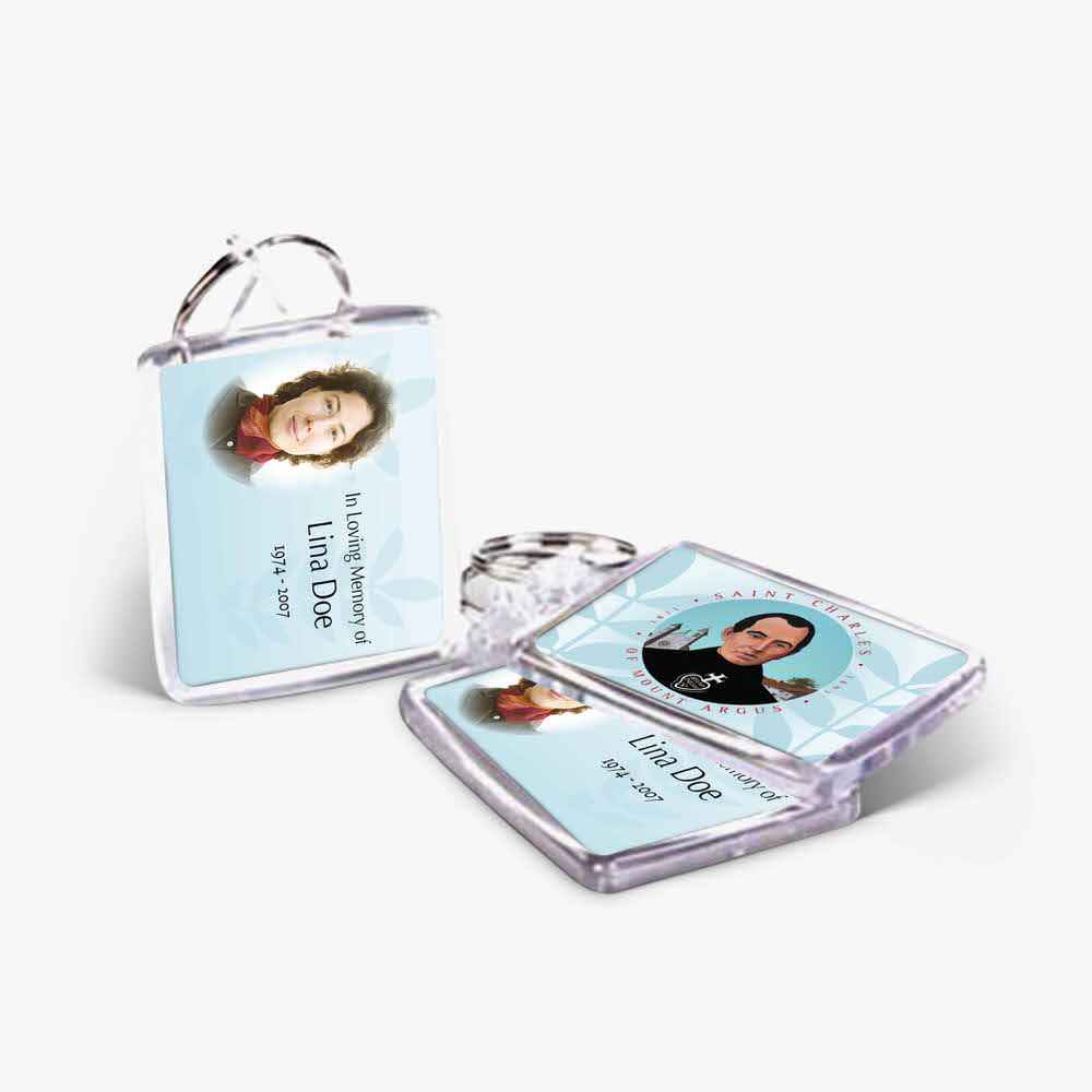 a photo card and a key chain with a picture of a man