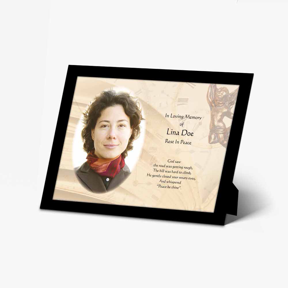 a memorial photo frame with a photo of a woman in a red scarf