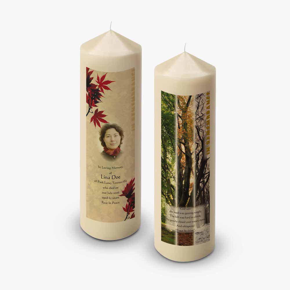 two candles with a picture of a woman on them