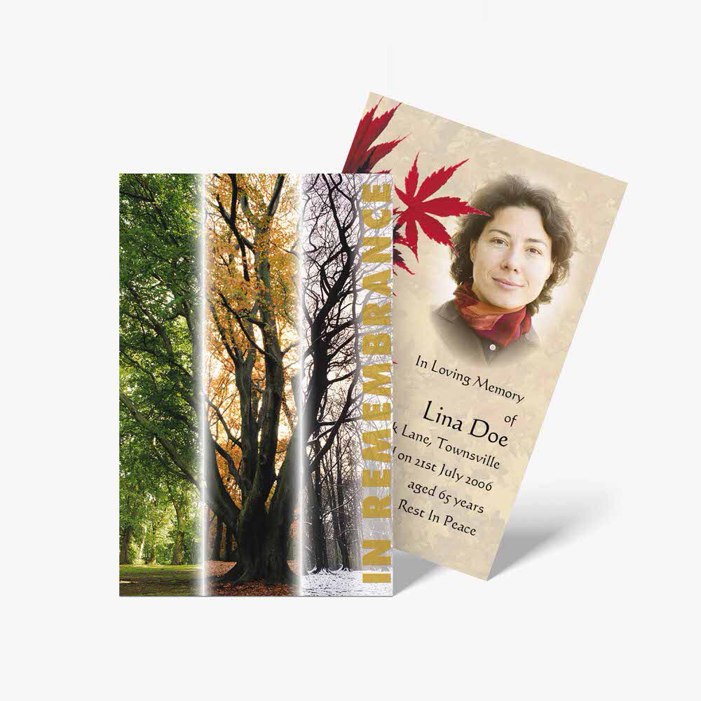 a memorial card with a photo of a woman in a tree