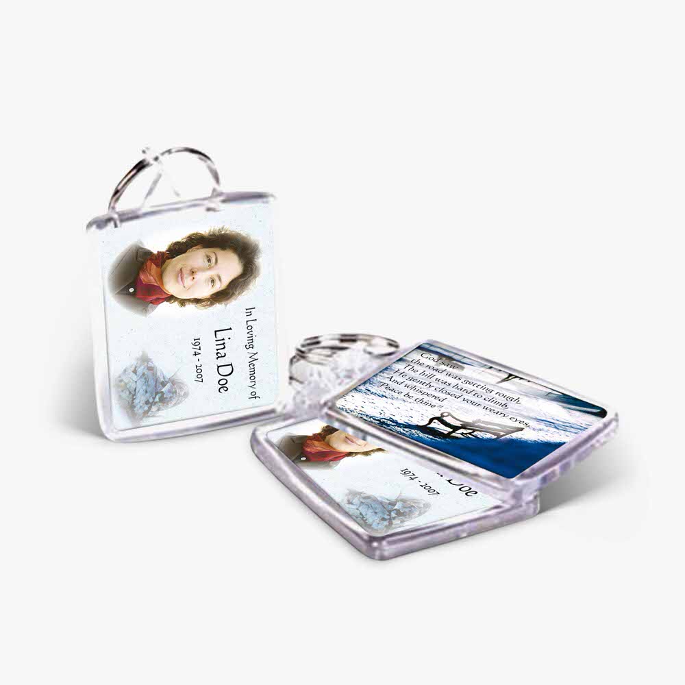 a clear plastic keychain with a photo of a woman