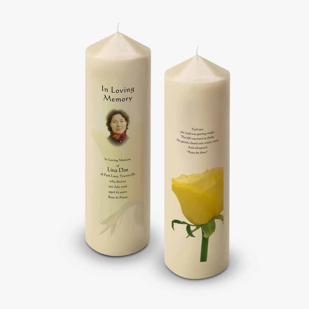a yellow rose candle with a photo of a woman