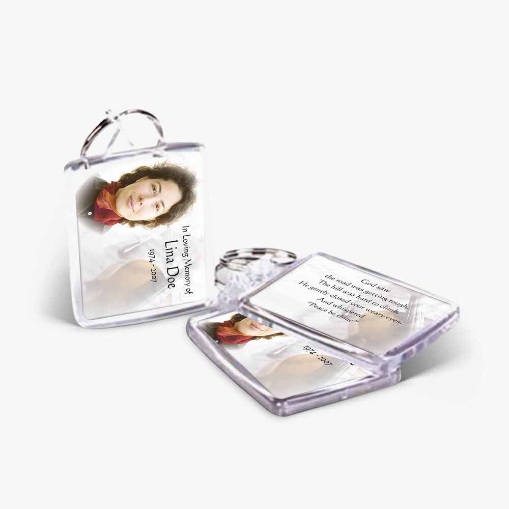 a clear plastic key chain with a photo of a woman