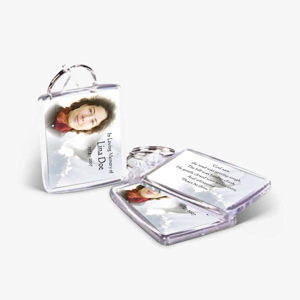 a photo frame with a key chain and a photo of a woman
