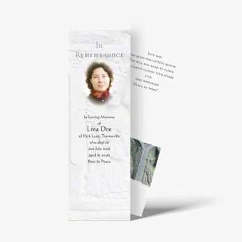 a bookmark with a picture of a woman in a white dress