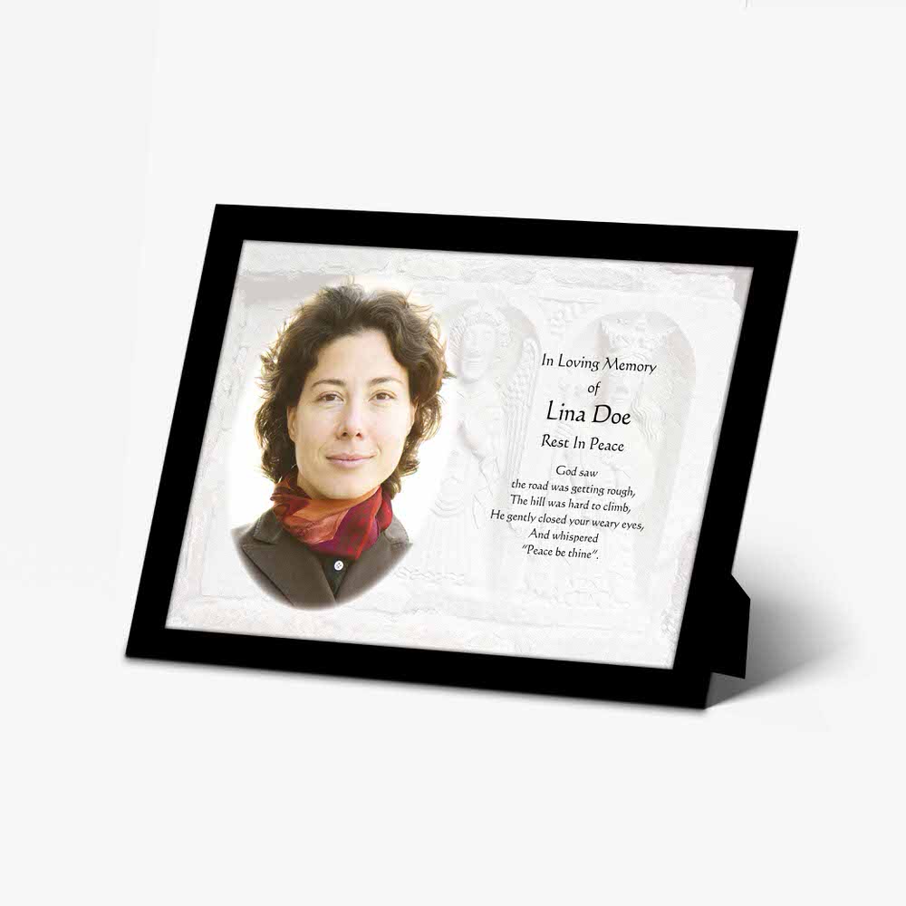 a memorial photo frame with a photo of a woman in a red scarf