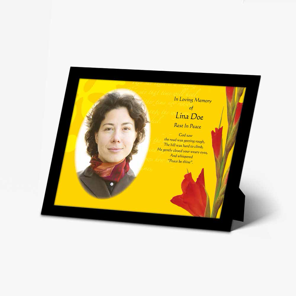 a beautiful memorial photo frame with a yellow flower