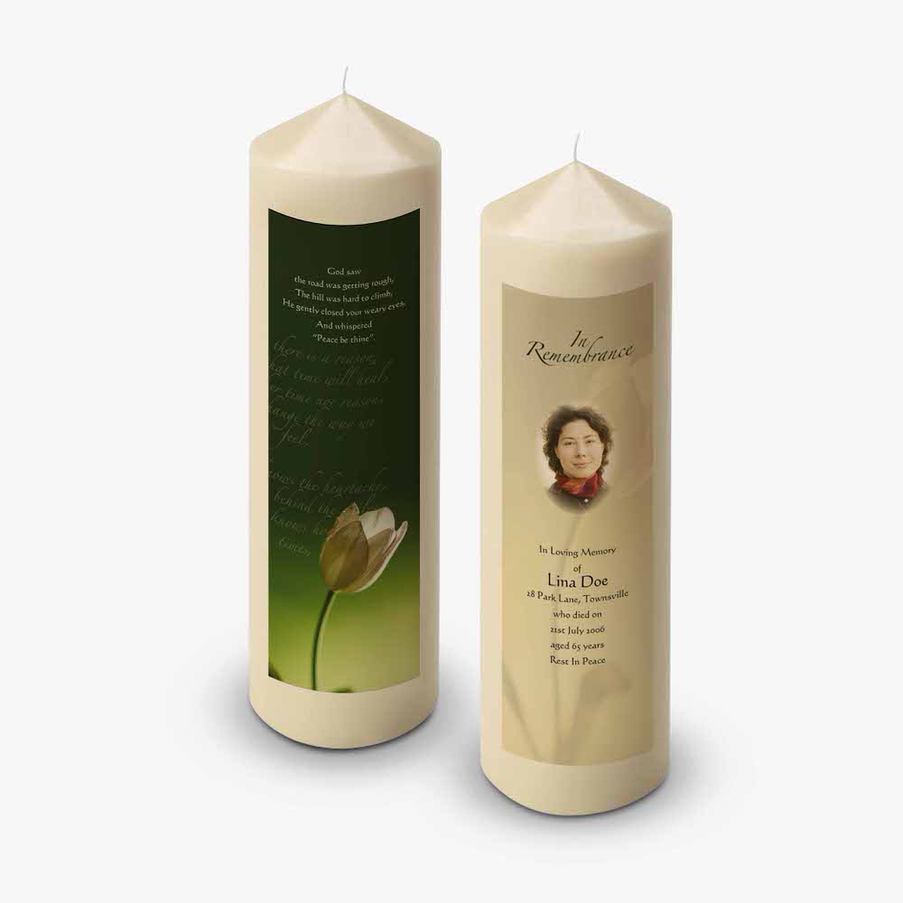 a candle with a picture of a woman and a flower