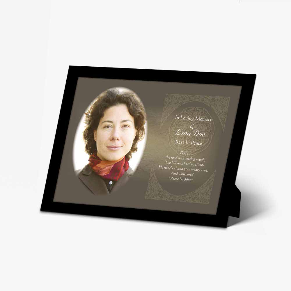 a funeral photo frame with a woman's picture