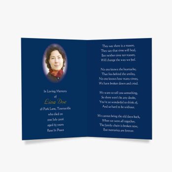 a blue funeral card with a photo of a woman in a blue dress