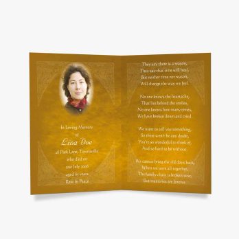 a golden funeral card with a photo of a woman in a gold dress