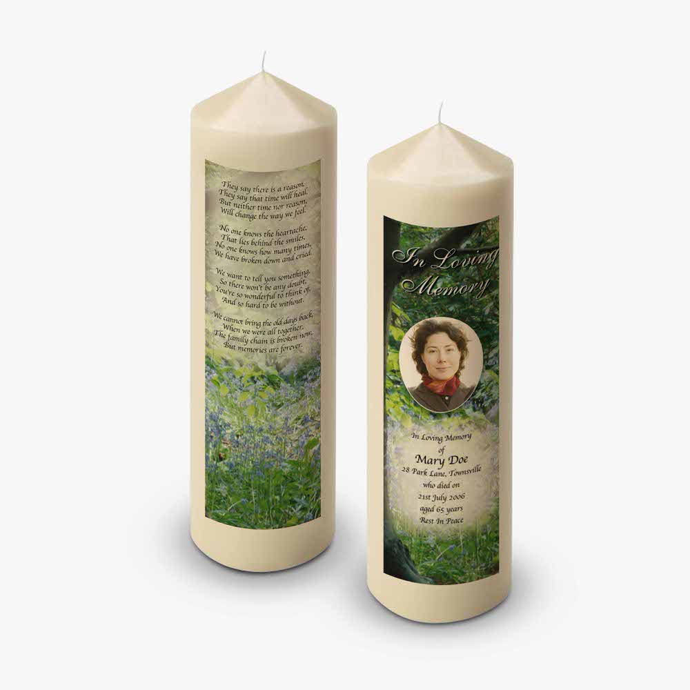 a candle with a poem and a picture of a woman in a field