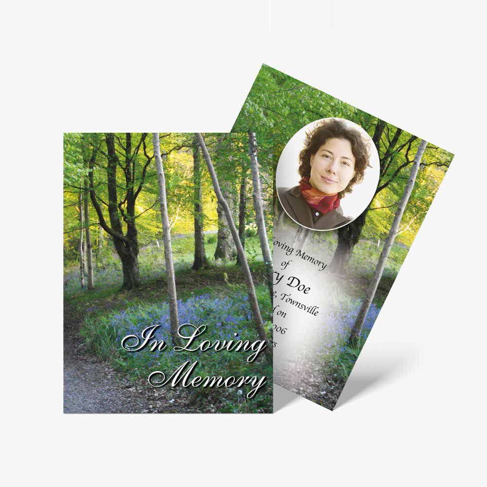 funeral cards with photo of a woman in the woods