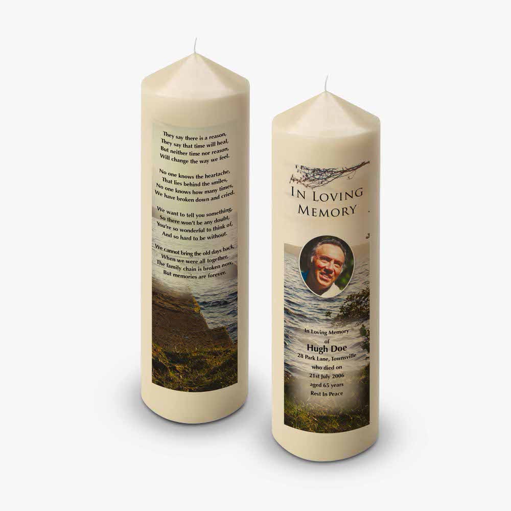 two candles with a picture of a man on them